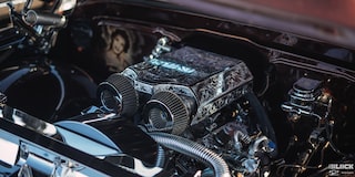Close-up of a Vehicle Engine with Steel Exterior and Beautiful Design Embedded on It