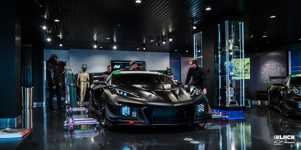 Front Three-Quarters View of a Chevrolet Corvette on Display in a Showroom