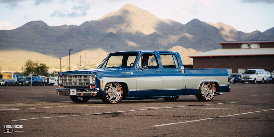 Front Three-Quarters View of Rodney Harris' Chevrolet 1979 C10 Crew Cab Truck in a Parking Lot