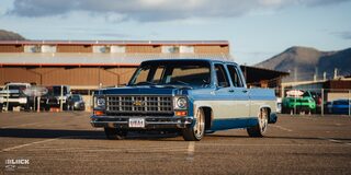Close-up Front Three-Quarters View of Rodney Harris' Chevrolet 1979 C10 Crew Cab Truck in a Parking Lot