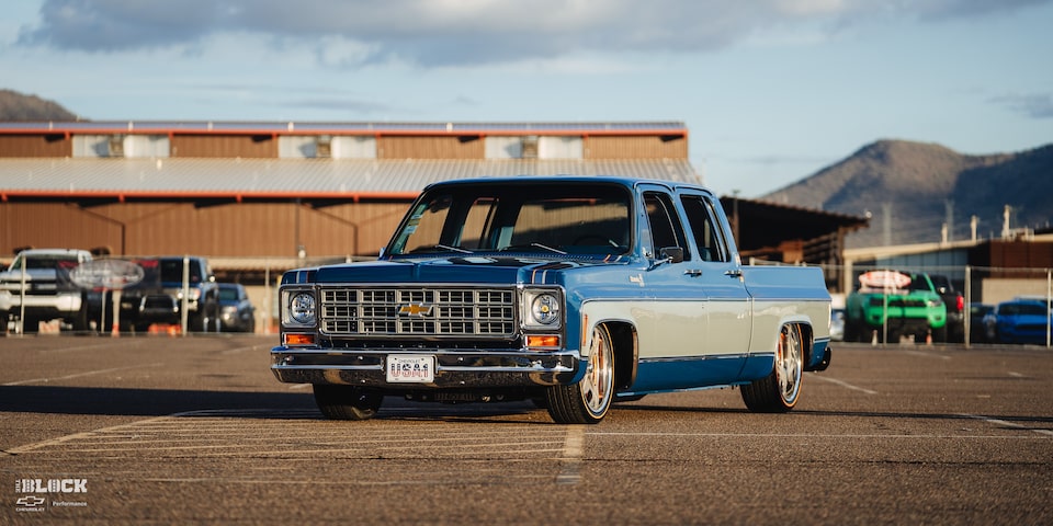 Close-up Front Three-Quarters View of Rodney Harris' Chevrolet 1979 C10 Crew Cab Truck in a Parking Lot