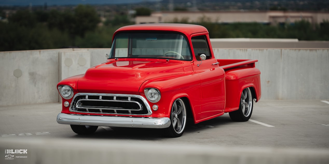 Close-up Front Three-Quarters View of David Kinnison's 1957 Chevrolet 3100 Truck in a Parking Lot