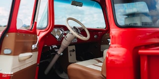 View of the Steering Wheel and Driver's Seat in David Kinnison's 1957 Chevrolet 3100 Truck