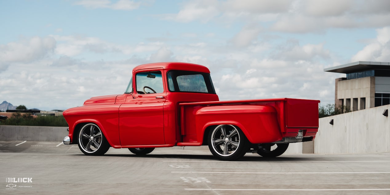 Rear Three-Quarters View of David Kinnison's 1957 Chevrolet 3100 Truck in a Parking Lot