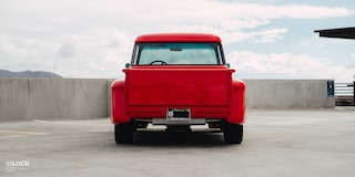 Rear View of David Kinnison's 1957 Chevrolet 3100 Truck in a Parking Lot