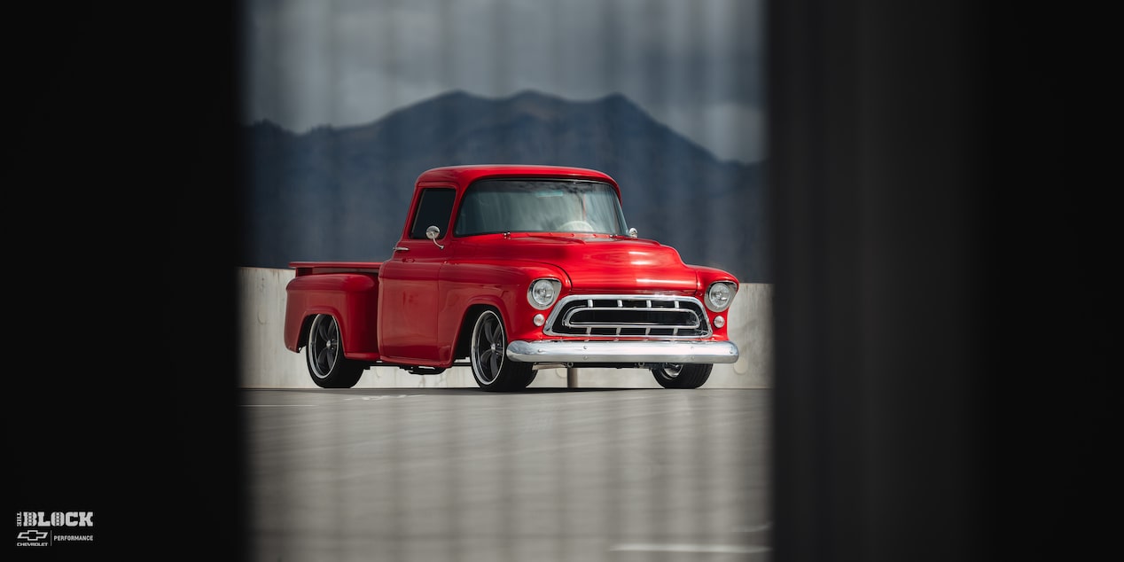 Wide Front Three-Quarters View of David Kinnison's 1957 Chevrolet 3100 Truck in a Parking Lot