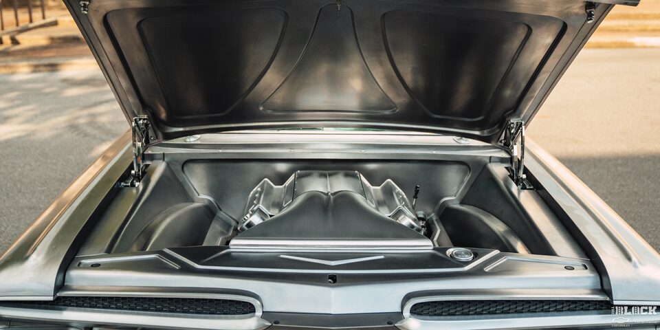 Frontal View of the Engine of a 1959 Chevy Impala with the Hood Open