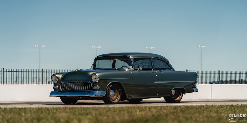 Three Quarters View of a 1955 Chevrolet under a Clear Blue Sky