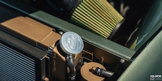 Close-up of the Interior Parts Next to the Engine of a 1955 Chevrolet