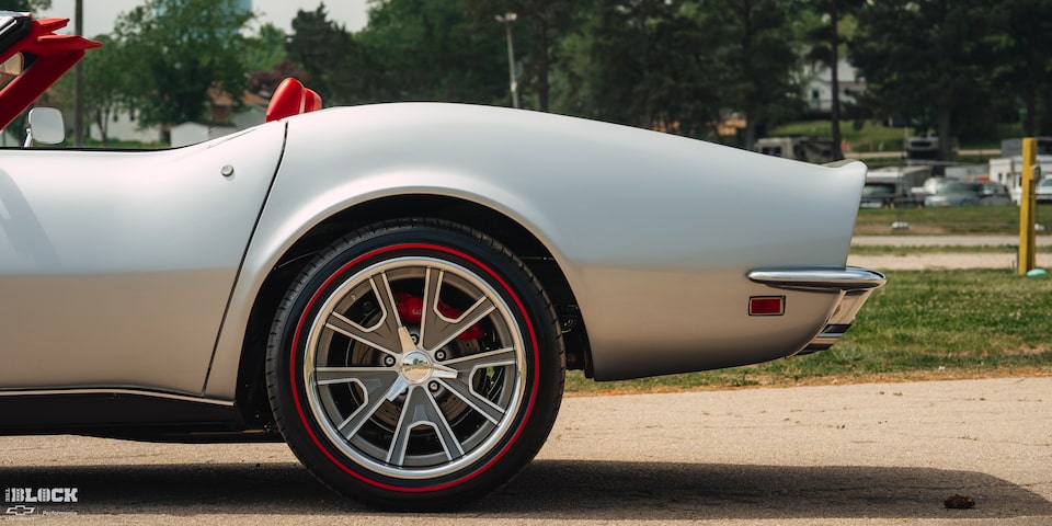 Low Side View of a 1969 Silver Chevy Corvette Back Left Tire