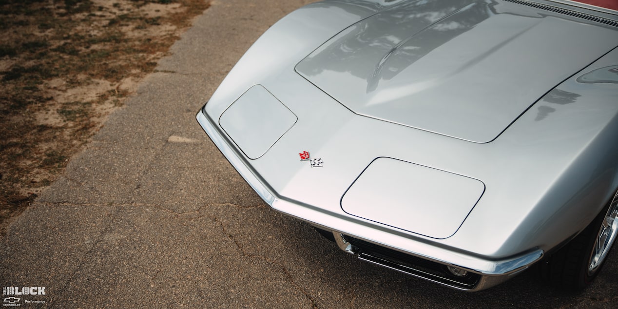 Overhead View of the Hood of Don Milligan's Silver 1969 Corvette Stingray with the Corvette Logo Hood Ornament
