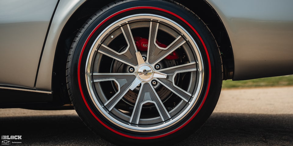 Close-up of a Tire with a Red Finish and a "Forgeline" Logo on Don Milligan’s Silver 1969 Corvette C3 Stingray