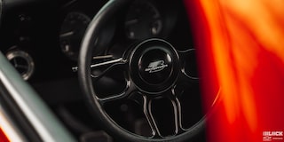 A Shot of the Steering Wheel of 1968 Chevy Camaro Taken from the Left Window