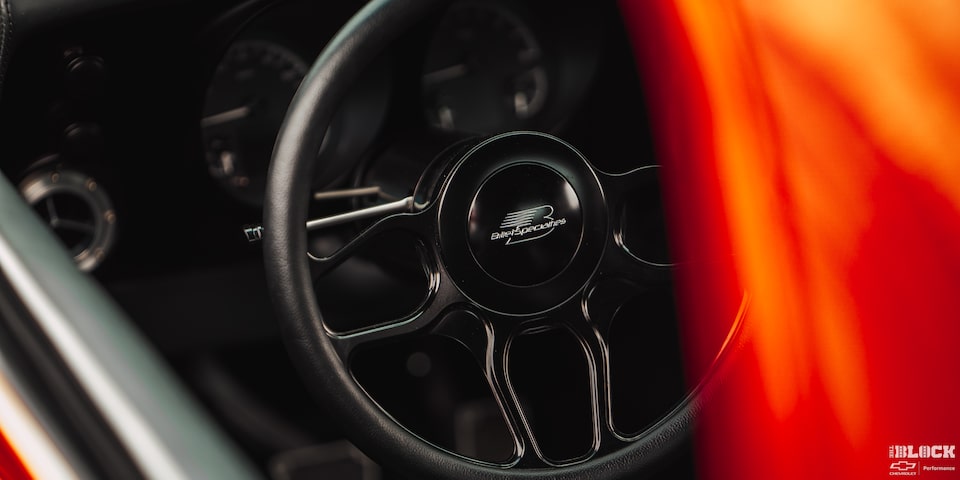 A Shot of the Steering Wheel of 1968 Chevy Camaro Taken from the Left Window