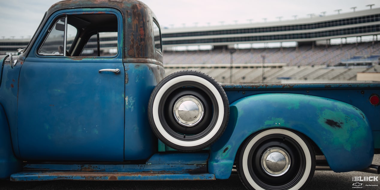 Left Side View of a Rusty Blue 1955 Chevy Pickup Truck