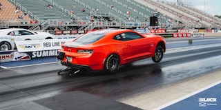 Close Up of a Chevrolet Copo Camaro Taking Off From the Starting Line