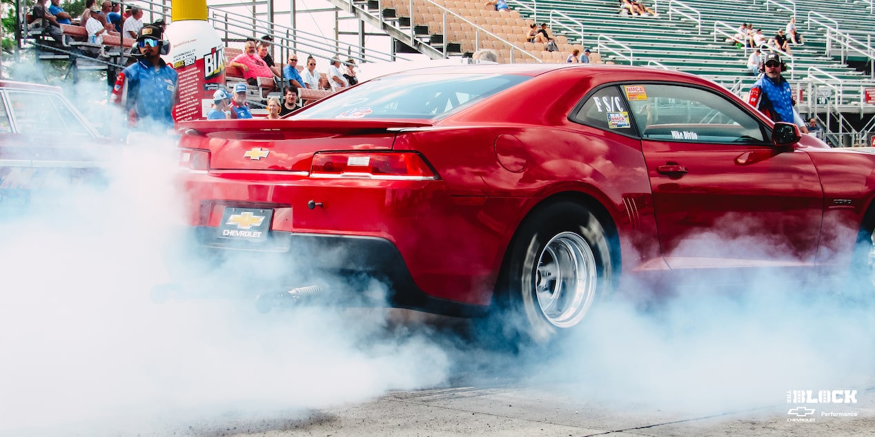 Close Up of a Chevrolet Copo Camaro Performing a Burnout