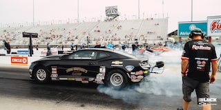 Rear Three-Quarters View of a Chevrolet Copo Camaro on the Track