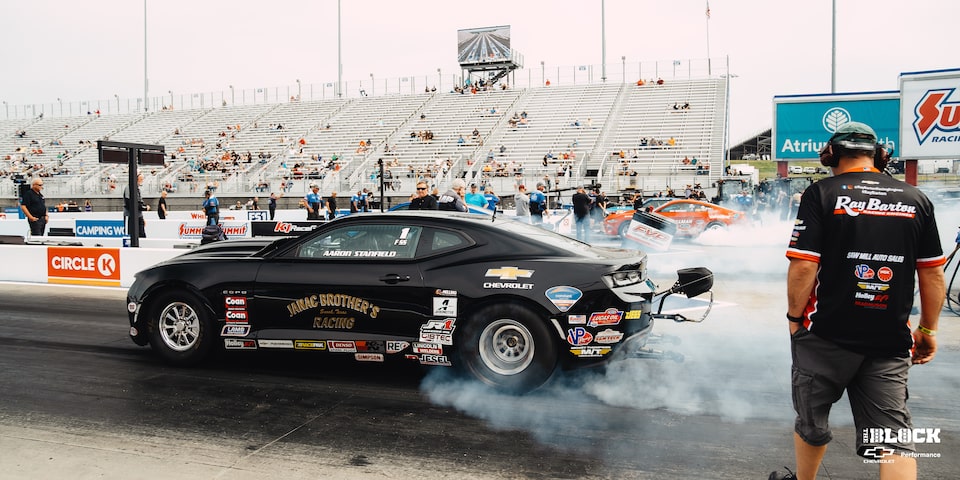 Rear Three-Quarters View of a Chevrolet Copo Camaro on the Track