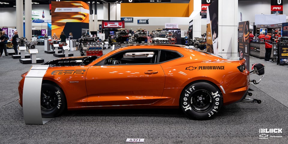 Side View of a Chevrolet Copo Camaro in a Showroom
