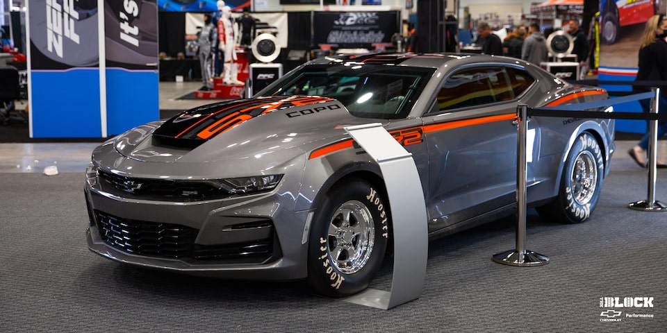Front Three-Quarters View of a Chevrolet Copo Camaro in a Showroom