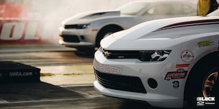 Close Up of a Chevrolet Copo Camaro's Grille While On The Race Track