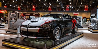 Front Three-Quarters View of a Special Edition Copo Camaro in a Showroom