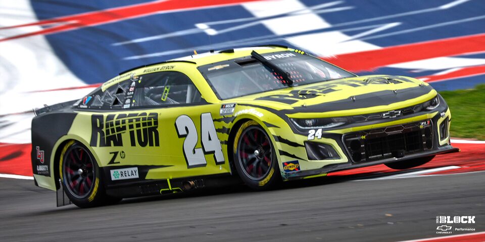 Front Three Quarters View of William Byron's Chevrolet Camaro Race Car at Circuit of the Americas in Austin, TX.