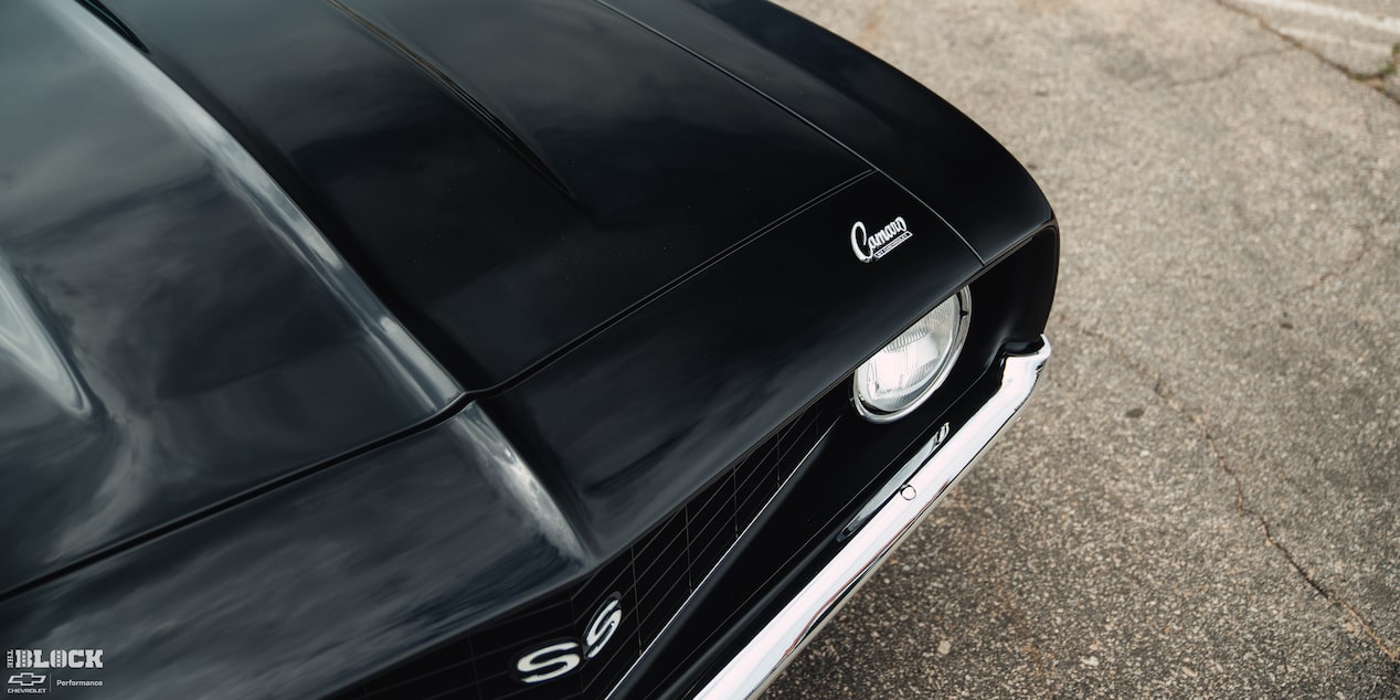 Overhead View of the Left Front of the "Camaro" Ornament on a Black Vintage 1969 Chevrolet Camaro SS