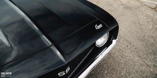 Overhead View of the Left Front of the "Camaro" Ornament on a Black Vintage 1969 Chevrolet Camaro SS