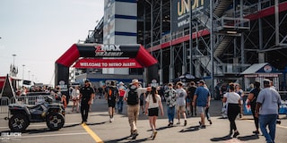 Spectators Enter the zMax Dragway at Charlotte Motor Speedway