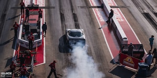 Overhead Rear View of a GM Sports Car Burning Rubber at the 2024 NHRA 4-Wide Nationals