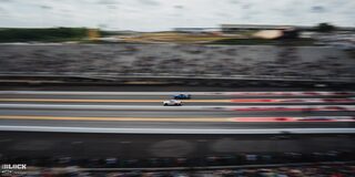 Faraway View of Two Funny Cars Racing at the 2024 NHRA 4-Wide Nationals