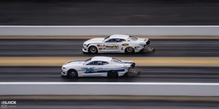 Two White Funny Cars Race Neck and Neck at the 2024 NHRA 4-Wide Nationals