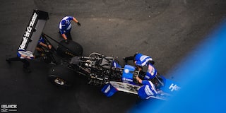 Overhead View of a Blue Race Car Being Maintained at Charlotte Motor Speedway