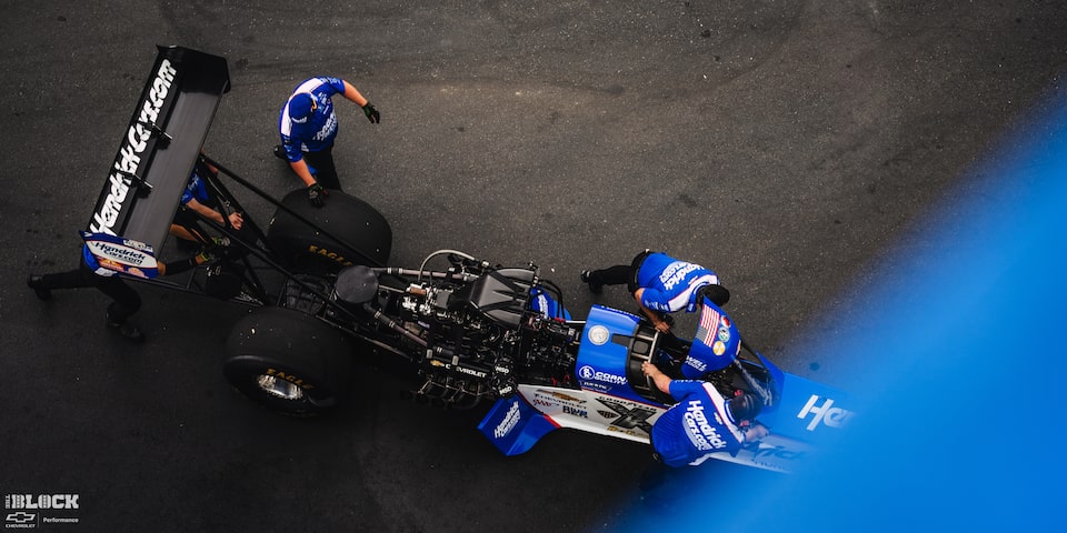 Overhead View of a Blue Race Car Being Maintained at Charlotte Motor Speedway