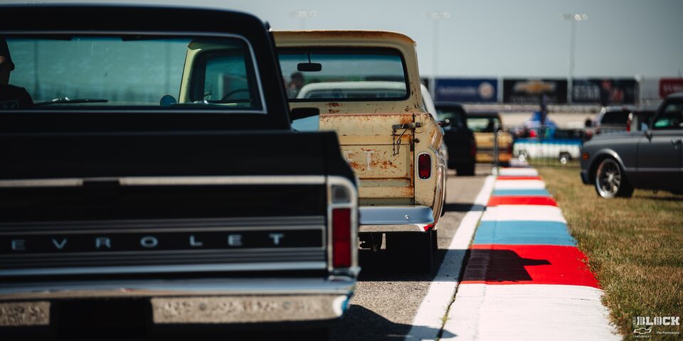 Line of Classic Chevrolet Pickup Trucks on the Track at Texas Motor Speedway