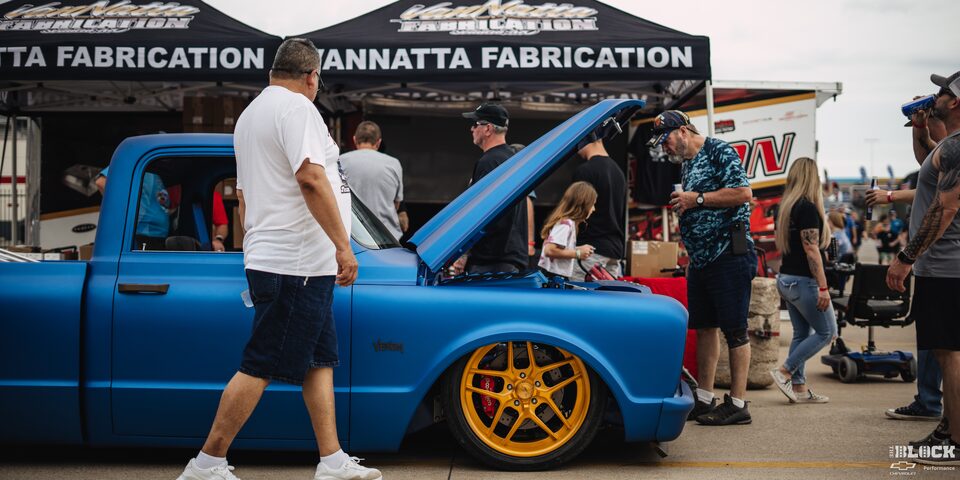 Side View of a Blue Lowrider Chevy Pickup Truck at Texas Motor Speedway