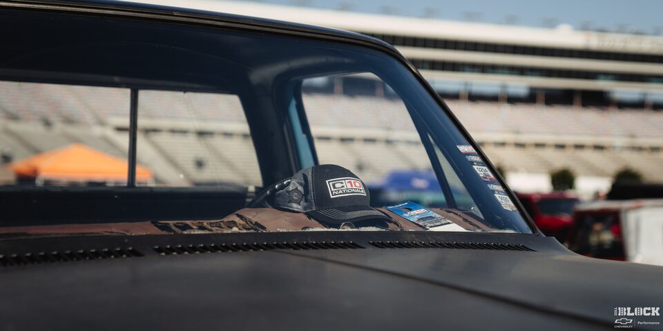 Close-up of a C10 Baseball Cap on the Dashboard of a Classic Chevrolet Pickup Truck