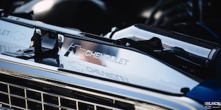 Close-up of "Chevrolet" Written on the Inside Hood of Ronnie and Tina Allen's 1972 Chevrolet C10
