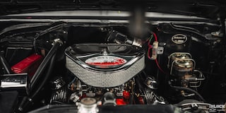 Front View of a Car Engine with the Front Hood Open
