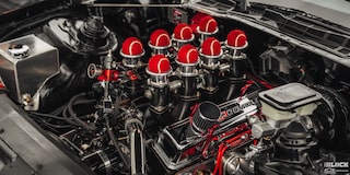 Three Quarters View of an Engine with Red Cylinder on Top