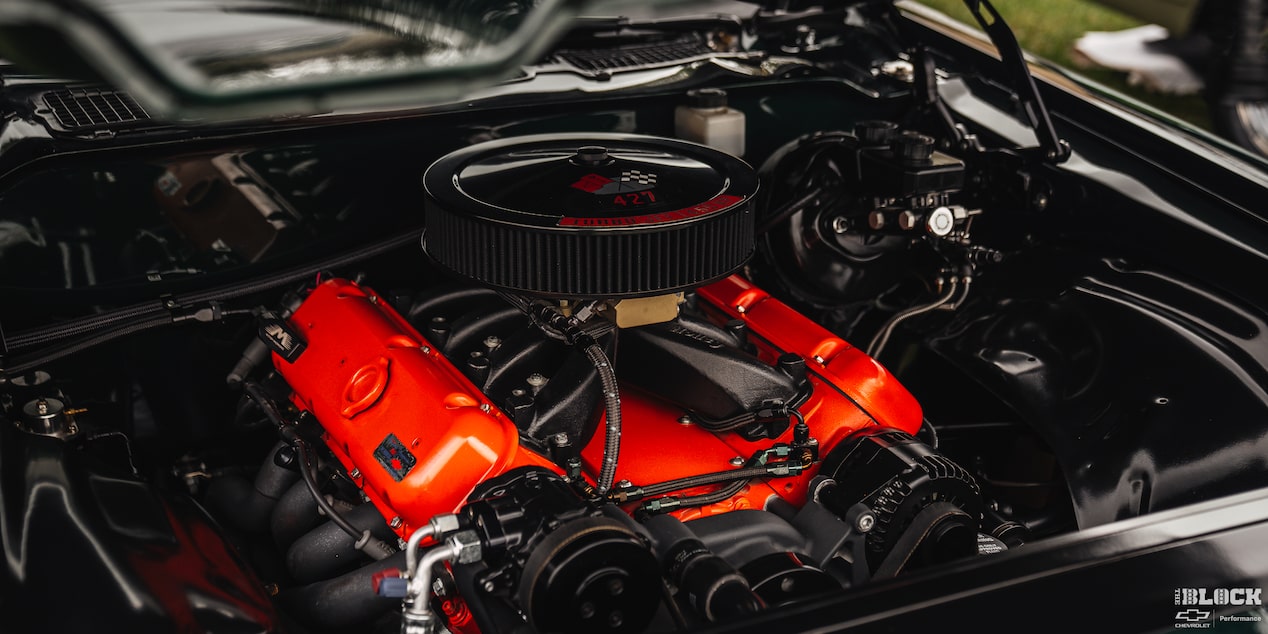 Three Quarters View of a Chevy Engine with an Orange Body 