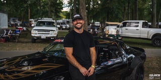 A Man Standing in Front of J.J. Alfano’s LS-powered 1978 Pontiac Firebird Trans Am