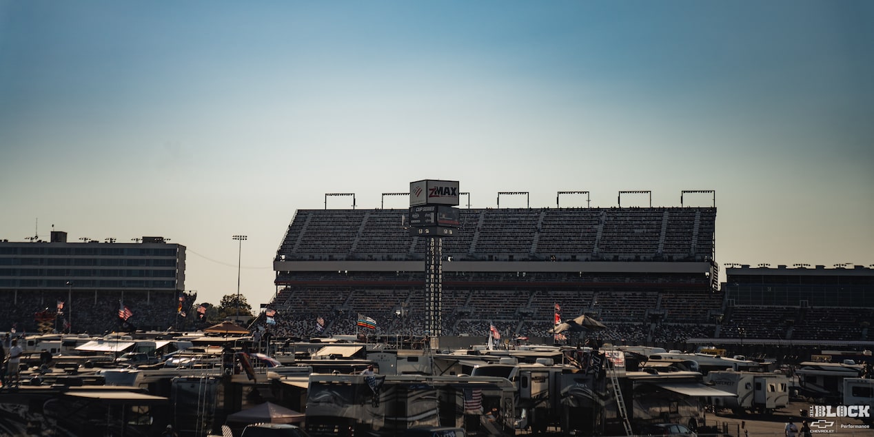 A Wide Angle Shot of a Stadium Full of Fans during a Sunset