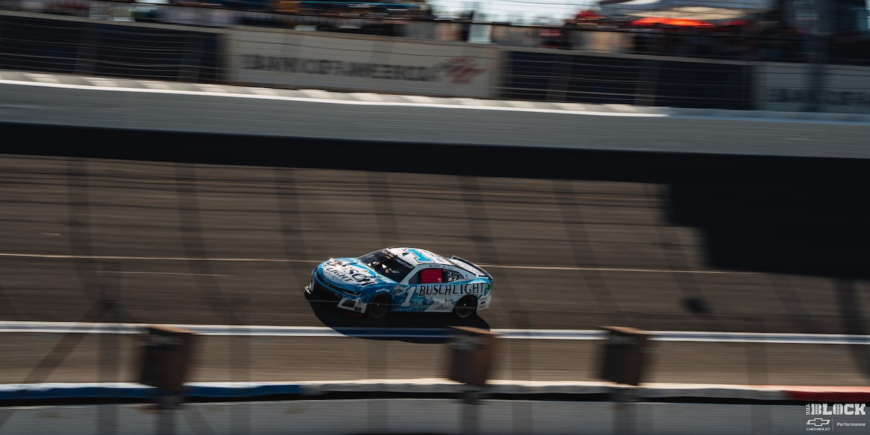 Overhead Shot of a Custom Chevy Racecar Speeding Down a Racetrack