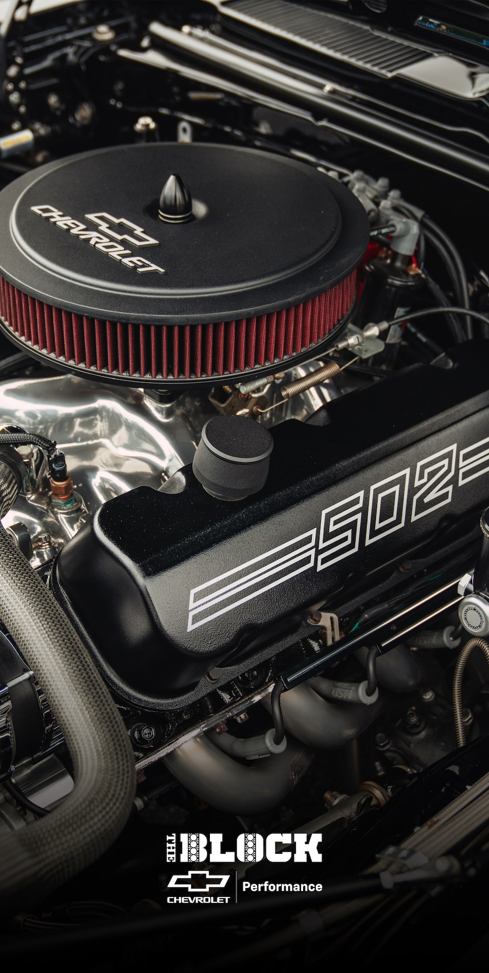Three Quarters View of an Engine with an Air Filter on Top Viewed as a Vertical Framed Image
