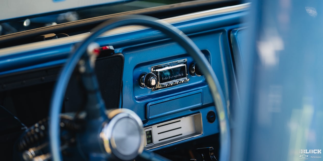 A View of the Front Interior Seen through the Steering Wheel of a Chevy C10 1967 Truck