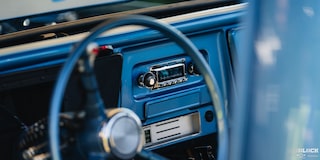 A View of the Front Interior Seen through the Steering Wheel of a Chevy C10 1967 Truck
