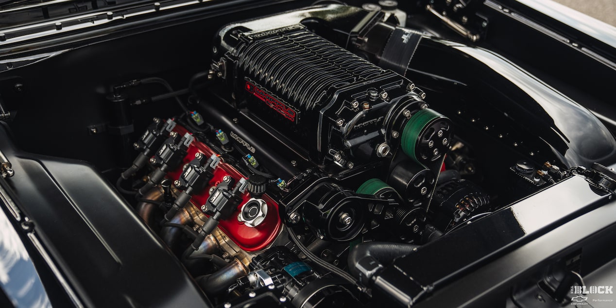 The LSX376-B15 crate engine* and Whipple supercharger under the hood.